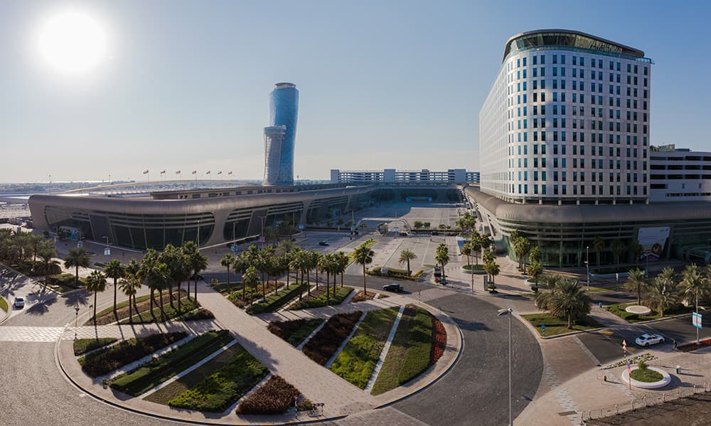 ADNEC, Abu Dhabi National Exhibition Centre, with the Capital Gate tower behind it